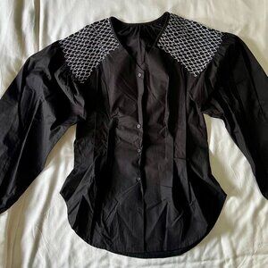 One by Two, Blouse